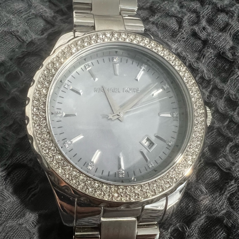 Michael Kors women’s stainless steel watch, light blue face, Chrystal accent